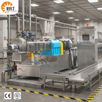 Ligne de production d'extrudeuse de nourriture sèche pour chiens et chats de 100 à 5000 kg par heure, machine à nourriture sèche pour chiens