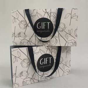 Venta al por mayor personalizado impreso respetuoso con el medio ambiente reciclado de papel Kraft blanco bolso de mano de cartón compras llevar bolsas de papel para los zapatos - Product Image 2