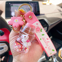 Hongna Internet celebridad dibujos animados chica corazón flor de cerezo conejo Metal botella flotante llavero estudiante mochila colgante aceite