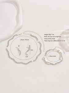 Parure de bijoux pour femme, luxe léger, avec boucles d'oreilles, bracelet et collier en zircon ondulé, ornée de cristaux noirs et blancs en forme de vague, pour mariage - Product Image 6