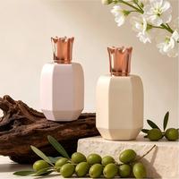 Flacon de parfum carré électroplaqué de luxe 100 ml, bouchon en zamac couronné, flacon en verre vide avec impression sérigraphique pour huile parfumée