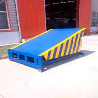 Niveleur de quai hydraulique fixe, pont de chargement d'entrepôt, plateforme de déchargement de conteneurs par chariot élévateur 6-15 tonnes