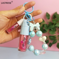 Ensemble de 2 huiles à lèvres hydratantes et brillantes avec porte-clés, vente en gros, marque privée, maquillage végétalien pour les lèvres, tubes grand et mini