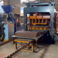 Renseignez-vous sur Qt10-15 Machine automatique de fabrication de briques en béton de ciment Production à grande capacité de briques à feu libre pour Kerbston