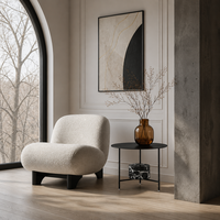 Table basse ronde sculpturale Noir Grand Siècle avec base tambour en pierre sablée noire, design de luxe personnalisable