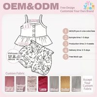 Ensemble haut et short personnalisé pour filles, très demandé, avec haut à volants et boutons décoratifs sur le devant, et bloomers à imprimé floral, idéal pour les pique-niques des tout-petits