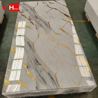 Nouvelle conception de panneau mural en PVC marbré veiné or, haute brillance, panneau décoratif en pierre plastique pour la conception de villas de luxe