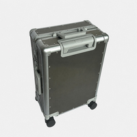 Valise à roulettes rigide ultra-légère en alliage de titane et d'aluminium de qualité OEM pour les acheteurs de marques de luxe