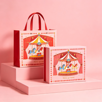 Boîte cadeau magnétique rigide sur le thème du cirque, personnalisée et luxueuse, avec sac en papier, vente en gros OEM, emballage de bonbons pour anniversaire d'enfants