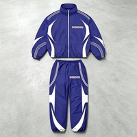 Ensemble de survêtement streetwear OEM personnalisé à rayures contrastées pour homme, ensemble veste coupe-vent surdimensionnée à fermeture éclair intégrale, fabricant