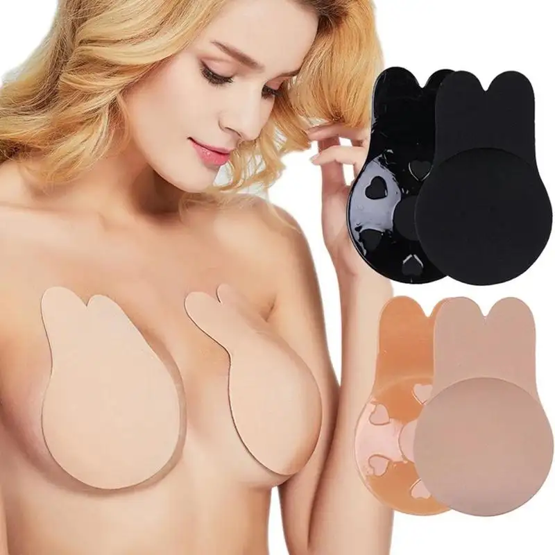 女性はブラジャーを押し上げる自己粘着性シリコンストラップレス目に見えないブラ再利用可能な粘着性のある乳房リフトテープラビット乳首カバーブラパッド