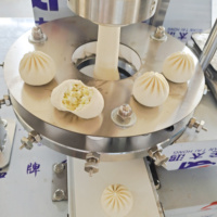 Prix le plus bas 	 Équipements de fabrication de momo (dumplings) 	 Machine à vapeur pour faire des baozi et des momo 	 Machine à faire des dim sum