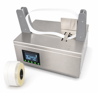 Machine d'emballage de table pour la pose de bandes de papier thermoscellables de 40 mm de large pour petites boîtes