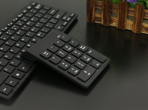 Miniteclado numérico inalámbrico de 18 teclas al por mayor para juegos de ordenador de oficina y negocios en stock - Product Image 4