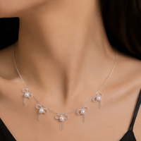 Collier de luxe en fausses perles avec nœud, plaqué or 18 carats, en argent, avec longue pampille de perles épaisses, parure de bijoux pour femme