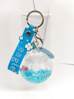 Fabricant OEM ODM, Vente en gros : Porte-clés mini donut créatif et original, avec paillettes, sequins et flotteur aquatique à sable mouvant, idéal comme souvenir, cadeau ou jouet
