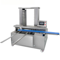 Machine automatique de positionnement précis pour l'agencement de pâtisseries (gâteaux au pain, gâteaux à l'ananas, pâtisseries aux flocons de noix de coco, shortbread, mochi, mooncakes) sur plateau