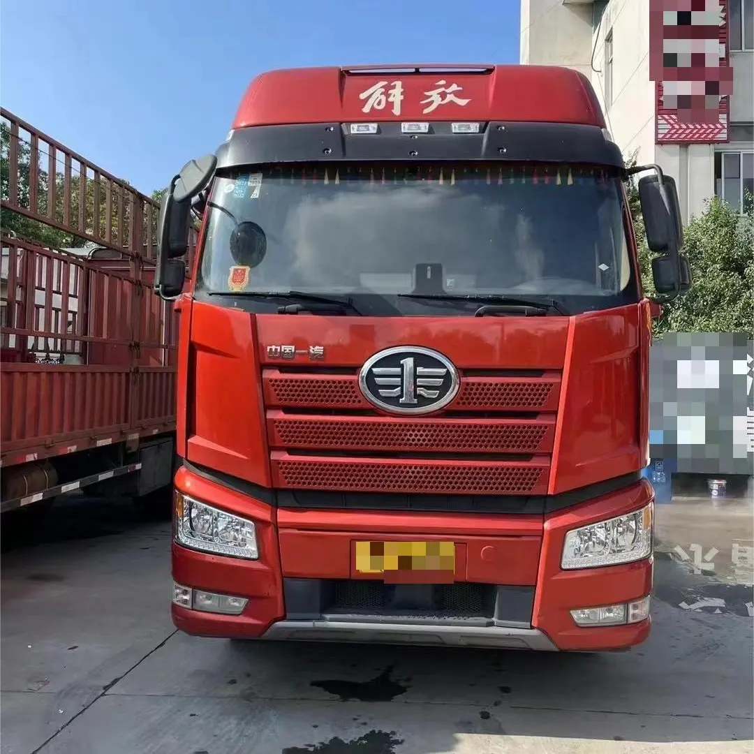 Faw Jiefang J6P dizel traktör kamyonları 460hp 40ton 6x4 kullanılmış Prime Logistics lojistik ulaşım römorku kafa çekme 6*4 traktör kamyon