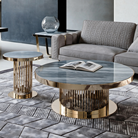 Table basse gigogne de luxe en pierre frittée ronde avec bande verticale dorée en acier inoxydable, ensemble de tables à thé personnalisées pour salon