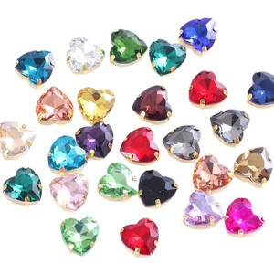 Venta al por mayor de accesorios de joyería DIY con diamantes de cristal en forma de corazón y diamantes de cuatro puntas en forma de corazón. - Product Image 1