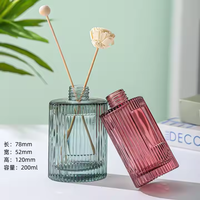 Bouteille ronde de diffuseur d'arômes de décoration d'intérieur à rayures de 120ml avec impression de logo personnalisé Bouteille de diffuseur de parfum en verre de roseau de 4 oz