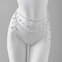 Chaîne de taille en perles multicouches personnalisées avec pompon et boucle ardillon en cuivre pour robe et jean femme – Vente en gros