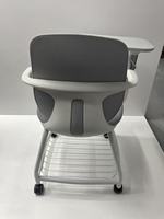 Chaise d'étude blanche pour l'école avec tablette intégrée