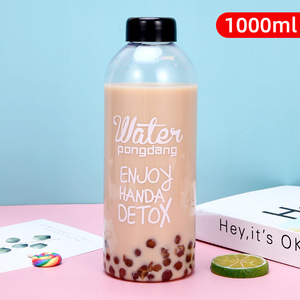 Plastic Beverage Bottle With Black Cap Pink Liquid Inside For Tea And Juice Drinks Adult Use Camping Outdoor - Product Image 3