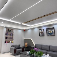 Panneau de plafond en aluminium nid d'abeille avec bande LED intégrée, résistant au feu, écologique, solution d'éclairage ambiant pour les espaces commerciaux de luxe