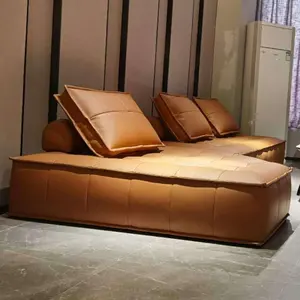 فوشان المصنع مباشرة توريد النمط الإيطالي العميق البرتقالي ثلاثة مقاعد جلدية غير النظامية L شكل أريكة لغرفة المعيشة أريكة