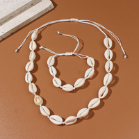 Collier ras du cou en coquillages Puka faits à la main pour l'été à Hawaï, accessoires de mode océaniques, ensembles de bracelets en coquillages tressés de plage et coquillages cauris