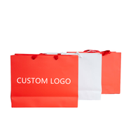 Sacs en papier imprimés de luxe, sacs en papier recyclables, sacs d'emballage pour vêtements de marque, sacs de shopping personnalisés avec logo