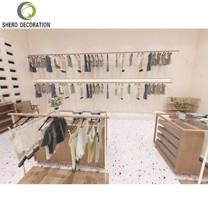 Diseño Moderno para Tienda de Bebés, Exhibidor de Ropa Metálico de Pared, Personalizable y Duradero, Muebles para Tienda de Ropa de Lujo - Product Image 5