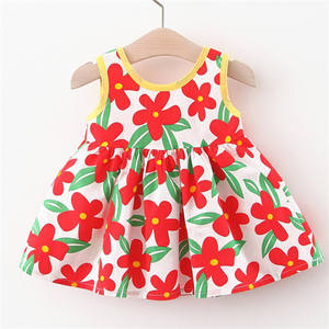 Precio al por mayor Vestido de verano para niñas con lazo, estampado completo, corto por delante y largo por detrás, con volantes, para niñas de las flores y bebés - Product Image 3