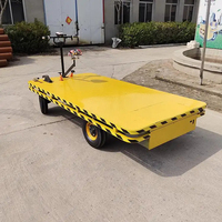 Chariot à Plateforme à Propulsion Électrique avec Siège, Chariot à Batterie à 4 Roues, Transporteur Plat de Cargaison Électrique de 2 Tonnes