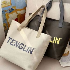 กระเป๋าหิ้วผ้าฝ้ายแบบมีซิปสั่งทำขายส่ง พร้อมหูจับเชือกฝ้าย ใช้ซ้ำได้ เหมาะสำหรับเป็นของขวัญส่งเสริมการขายและใช้ในชีวิตประจำวัน - Product Image 2