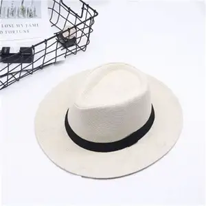 Vente en gros Chapeau de paille Fedora Panama d'été avec logo personnalisé Chapeau de soleil de plage enroulable à large bord pour femmes hommes pour scènes de fête en plein air