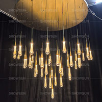 Lustre en cristal de luxe de 58 pouces pour escalier, suspension en forme de goutte de pluie, luminaires contemporains en verre pour plafonds hauts ou villas avec escalier