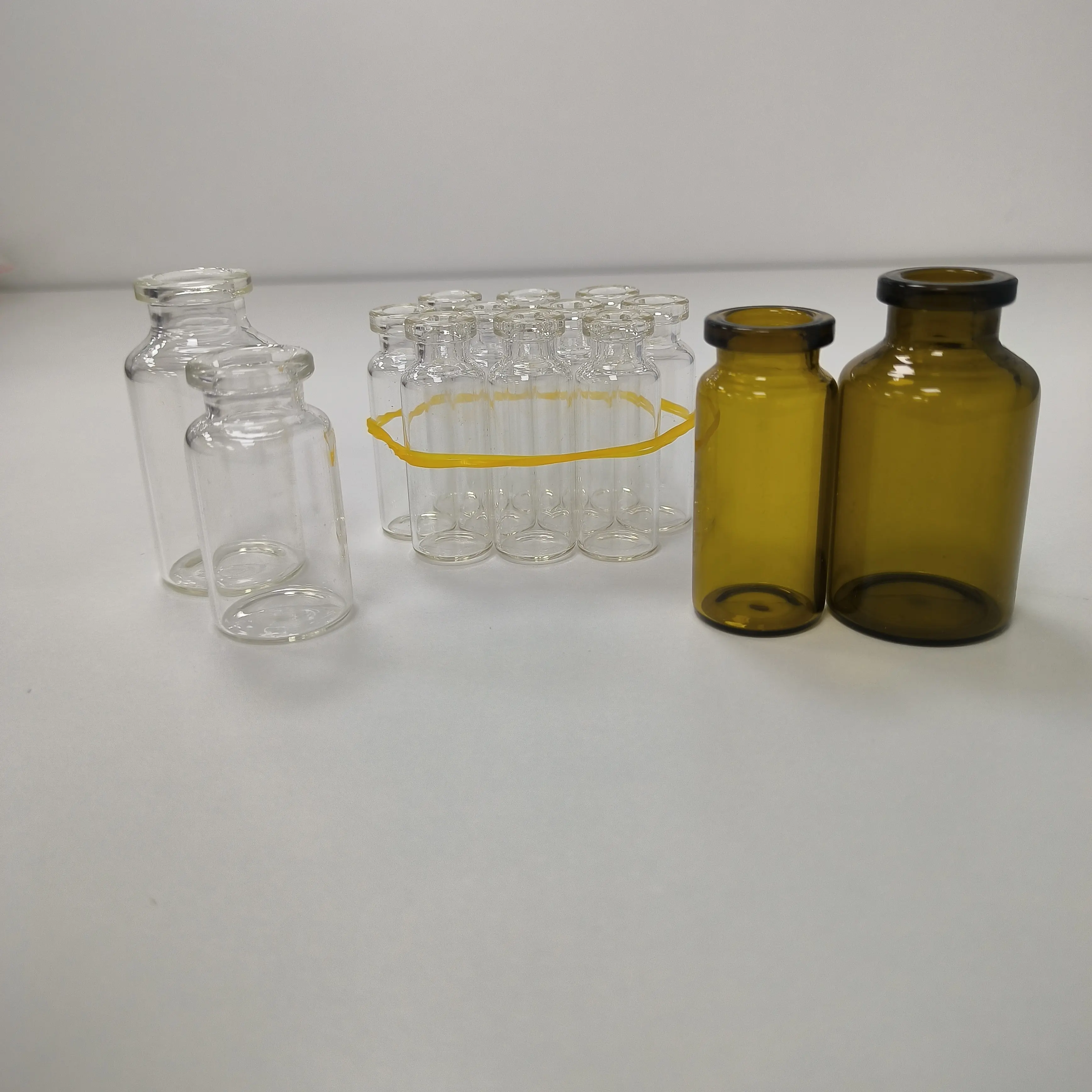 Nieuw Ontwerp Custom Mini Bedrukte Glazen Parfumfles Doorzichtige Amber Farmaceutische Glazen Flesjes Groothandel