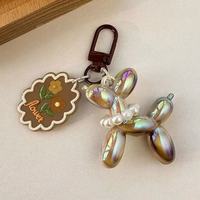Porte-clés en forme de chien ballon à fleurs couleur café, pendentif Melad, étui personnalisé pour écouteurs, décoration pour sac à main pour femme