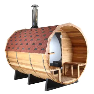 Sala de sauna de barril de madera de cedro rojo de lujo panorámica al aire libre con calentador