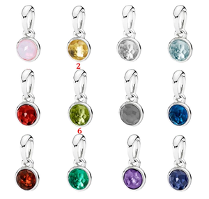 Assorted birthstone pendants in 925 silver on display