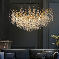 Lustre suspendu de luxe pour la décoration de la maison ODM/OEM, lustre en cristal à gouttes de pluie LED