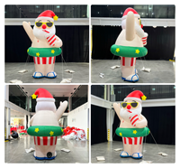 Père Noël gonflable d'été avec bouée et lunettes de soleil, décoration de Père Noël imperméable, buvant du jus et se relaxant sur la plage