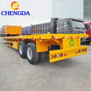 <span class=keywords><strong>Remolque</strong></span> semiplano de <span class=keywords><strong>doble</strong></span> <span class=keywords><strong>eje</strong></span> de 40 pies con material de acero de suspensión Bogie - Product Image 1