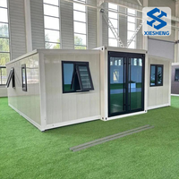 Maison moderne de luxe préfabriquée extensible pliante 20 pieds 30 pieds 40 pieds modulaire préfabriqué salon 2-3 chambres maison en conteneur