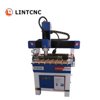 Petit routeur CNC 2x3 pieds publicité bois routeurs CNC Machine 6090 avec roue de pression pour bois MDF teck chêne