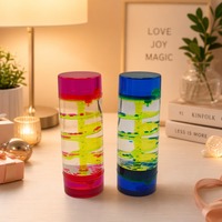 Tube sensoriel créatif en spirale avec minuterie liquide et bulles pour la relaxation et le jeu des enfants sur le bureau