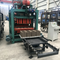 Machine automatique à briques de ciment par vibration QTJ4-25 pour la fabrication de blocs creux en béton et de pavés