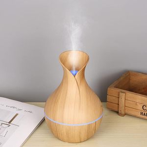 Mini humidificateur USB 130 ml à effet bois avec diffuseur d'arômes pour usage domestique - Product Image 1